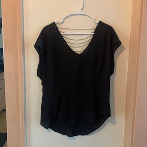 Semi-sheer black top with open back